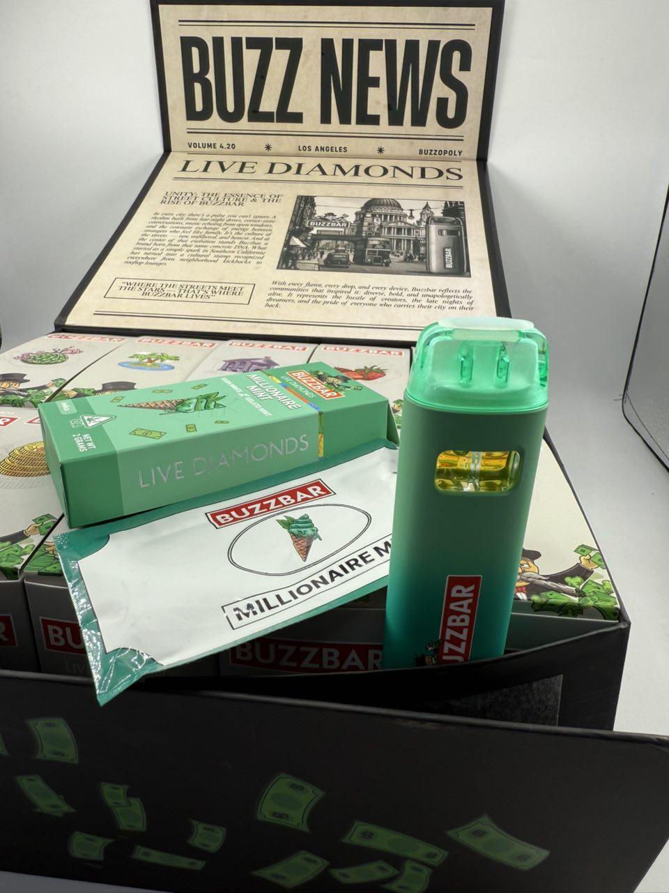 BuzzBar product display with a green shaker bottle and mint-green boxes labeled 'Live Diamonds' on a money-themed table display.